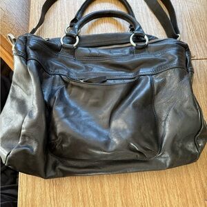 Womens Black Leather Bag comes with strap . 11" L X 7" W .